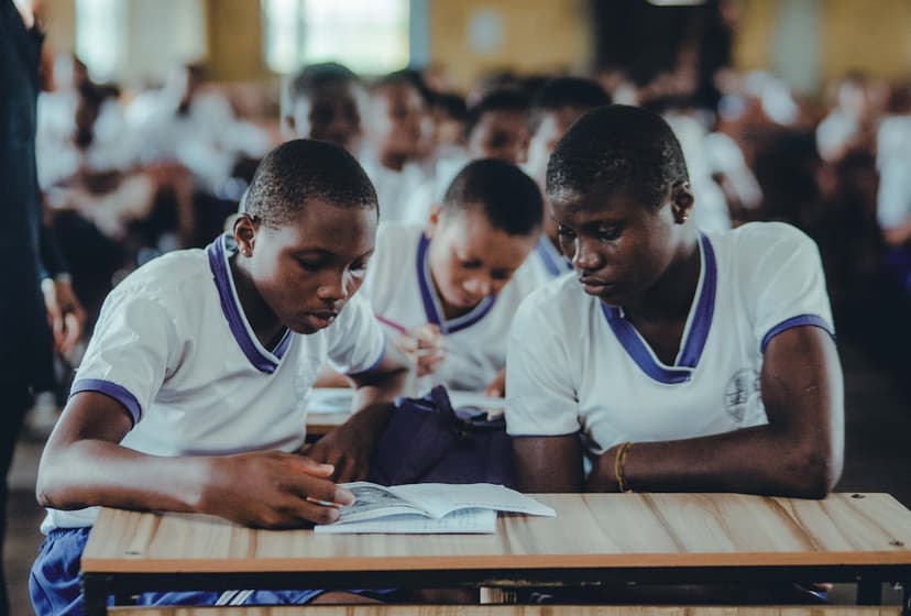 Students studying together with a laptop